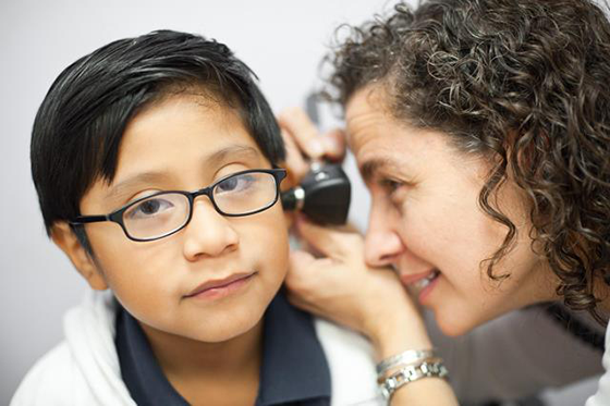 HEALTH-child-getting-ear-checked_1