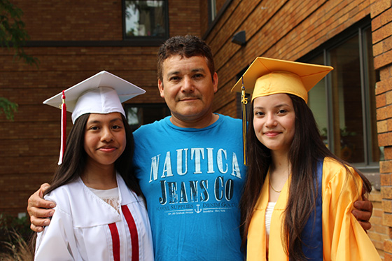 The “Equity and Excellence Project” delivers academic success workshops to empower parents and improve academic outcomes for students. (Left – Right: Yenny Gaspar – Union Graduate 2015, Parent – Jose Rivera, Jeanette Rivera – Godwin Heights Graduate 2015) Photo: Hispanic Center of Western Michigan