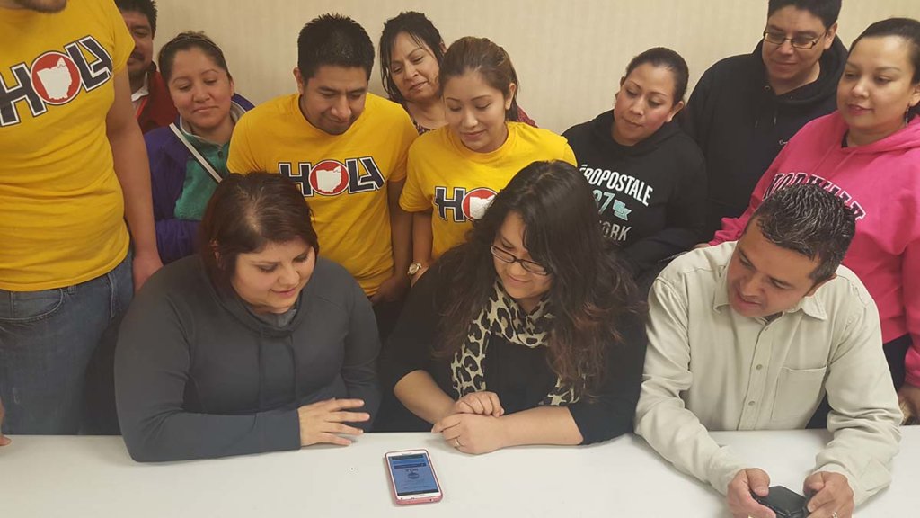 HOLA Ohio supporters register using a UnidosUS (formerly NCLR) mobile app. | HOLA Ohio voter registration
