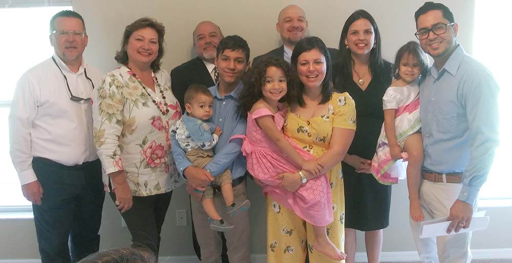 The Jurado-Santos family receiving their new home in Orlando in 2019.
