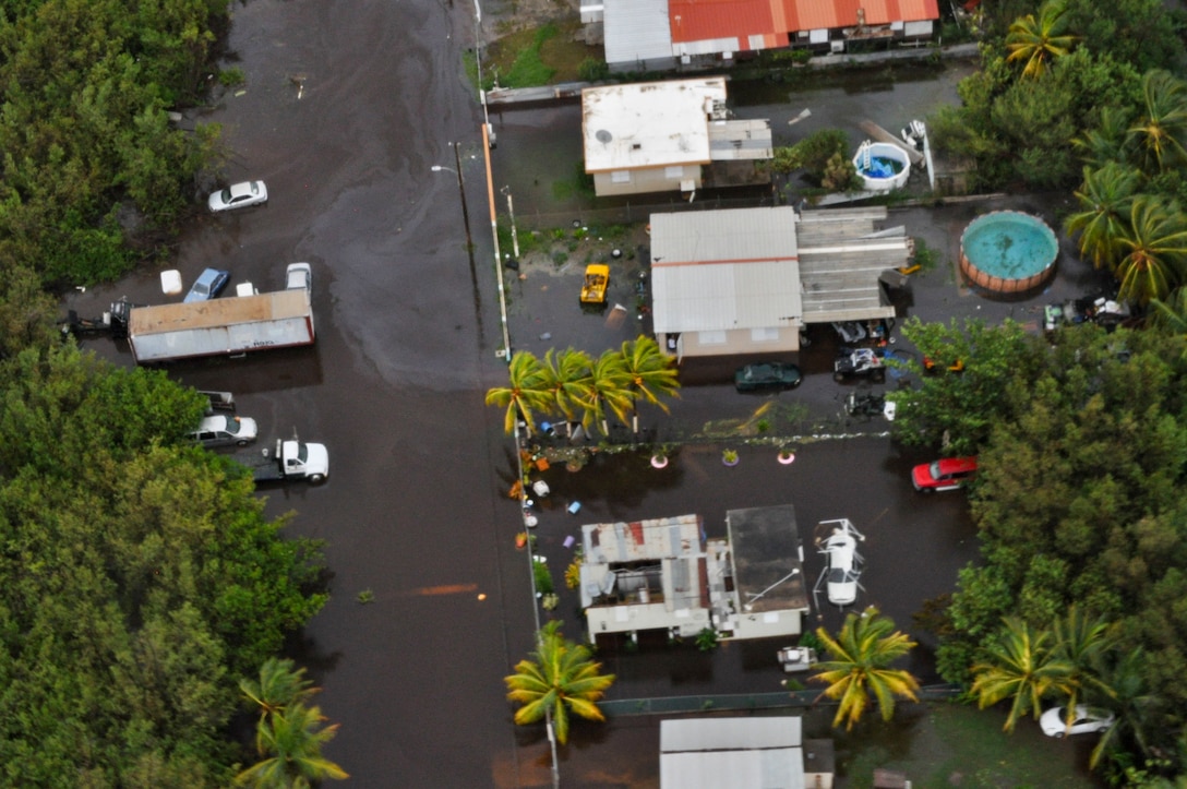 An aircrew from Coast Guard Air Station Borinquen conduct an overflight of Puerto Rico in the aftermath of Hurricane Fiona, Sept. 19, 2022. Photo By: Coast Guard Chief Petty Officer Stephen Lehmann VIRIN: 220919-G-D0439-001.JPG
