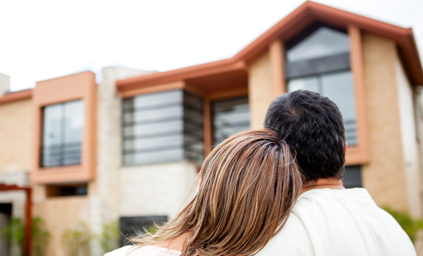 Couple dreaming of owning a new home.