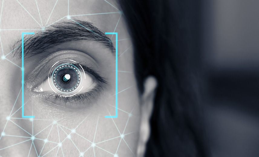Facial Recognition Technology focusing on a woman's left eye.