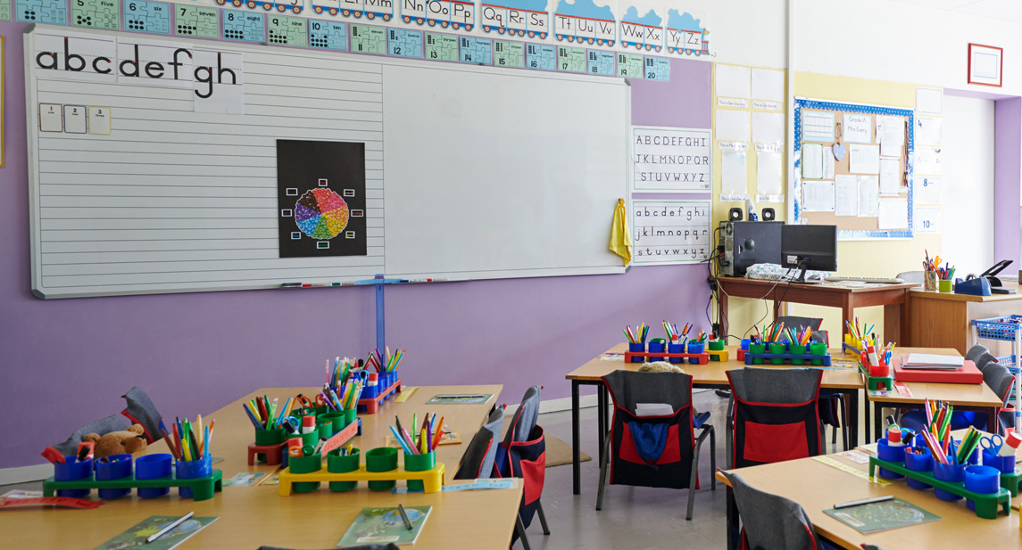 A bright empty elementary classroom.